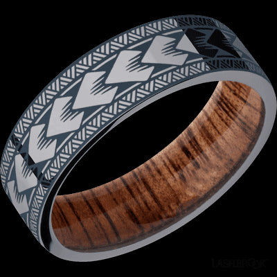 7 mm wide/Flat/Tantalum band with a laser carved Maori pattern also featuring a Koa sleeve.